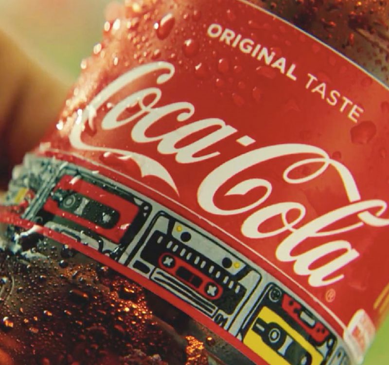 Coca-Cola-Etikett mit Festivalband 
